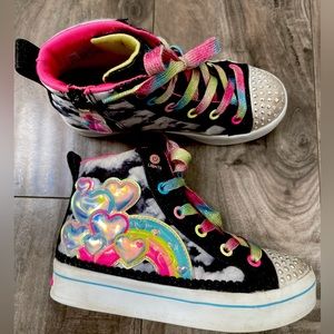 Super cute Sketchers twinkle toes high tops. Size 12. Good condition.